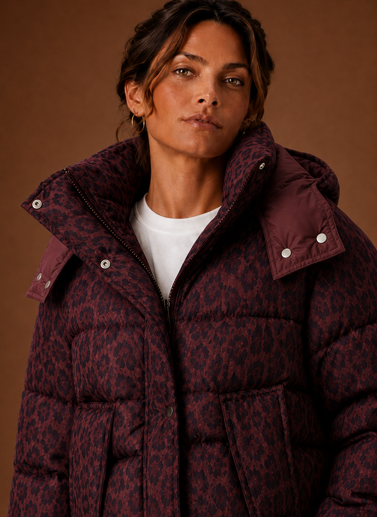 Close-up of leopard print pattern and quilting on the women's puffer jacket