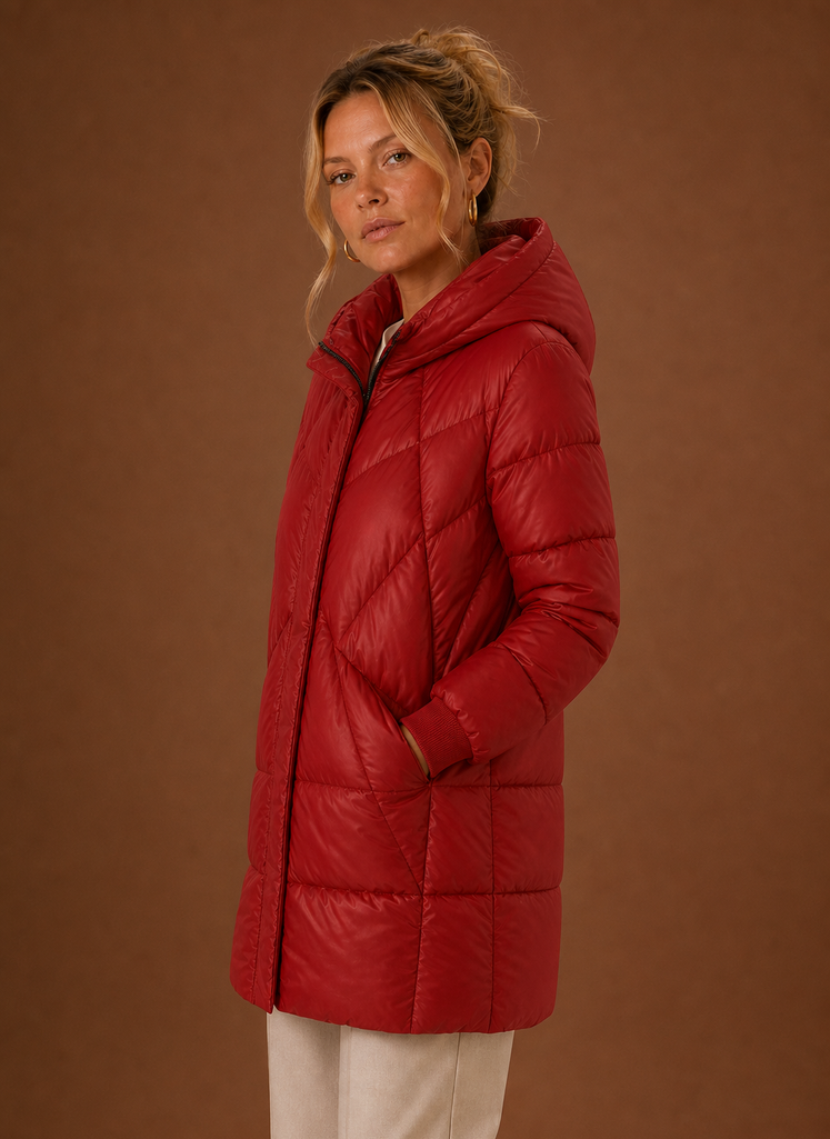 Side profile of the Areleon long puffer jacket with hood, highlighting the long cut and hooded neckline